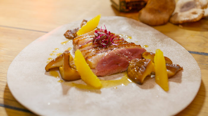Duck breast flambéed with Cointreau®, orange sauce